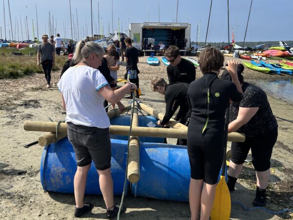 "Outdoor Skills Development: Raft Building at The Stable School" Our learners practice communication and cooperation through challenging and fun raft-building exercises.